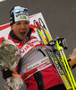 Winner Petra Majdic of Slovenia celebrates her medal won in women sprint race of Dobiacco-Toblach stage of Tour de Ski 2011. Sprint race of Tour de ski was held on Wednesday, 5th of January 2011 in Dobiacco-Toblach, Italy.
