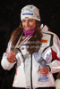 Second placed Justyna Kowalczyk of Poland celebrates her medal won in women pursuit race of  FIS Nordic skiing World championships in Oslo, Norway. Women pursuit race of FIS Nordic skiing World championships was held on Holmenkollen above Oslo, Norway, on Saturday, 26th of February 2011.
