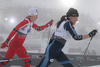 Krista Lahteenmaki of Finland and Astrid Jacobsen of Norway skiing in team sprint race of  FIS Nordic skiing World championships in Oslo, Norway. Team sprint race of FIS Nordic skiing World championships was held on Holmenkollen above Oslo, Norway, on Wednesday, 2nd of March 2011.
