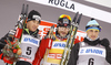 Winner Petter Northug of Norway (M), second placed Dario Cologna of Switzerland (L) and third placed Alexey Poltoranin of Kazakhstan (right) celebrate their medals won in men 15km classic race of FIS cross country skiing World cup race in Rogla, Slovenia. Men 15km classic race of FIS cross country skiing World cup was held on Rogla, Slovenia, on Saturday, 17th of December 2011.
