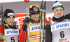 Winner Petter Northug of Norway (M), second placed Dario Cologna of Switzerland (L) and third placed Alexey Poltoranin of Kazakhstan (right) celebrate their medals won in men 15km classic race of FIS cross country skiing World cup race in Rogla, Slovenia. Men 15km classic race of FIS cross country skiing World cup was held on Rogla, Slovenia, on Saturday, 17th of December 2011.
