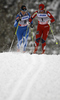 Vibeke Skofterud of Norway in front of Aino-Kaisa Saarinen of Finland skiing during women 10km classic race of FIS cross country skiing World cup race in Rogla, Slovenia. Women 10km classic race of FIS cross country skiing World cup was held on Rogla, Slovenia, on Saturday, 17th of December 2011.
