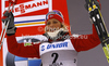 Second placed Therese Johaug of Norway celebrates her medal won in women 10km classic race of FIS cross country skiing World cup race in Rogla, Slovenia. Women 10km classic race of FIS cross country skiing World cup was held on Rogla, Slovenia, on Saturday, 17th of December 2011.
