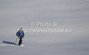Men walking during qualifications for men sprint free style race of FIS cross country skiing World cup race in Rogla, Slovenia. Men sprint race of FIS cross country skiing World cup was held on Rogla, Slovenia, on Sunday, 18th of December 2011.
