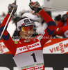 Winner Marit Bjoergen of Norway celebrates her victory in finals of women sprint free style race of Tour de Ski race of FIS cross country skiing World cup race in Toblach-Dobbiaco, Italy. Women sprint race, stage 6 of Tour de Ski and FIS cross country skiing World cup was held on Toblach-Dobbiaco, Italy, on Wednesday, 4th of January 2012.
