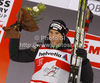 Overall Tour de Ski leader Dario Cologna of Switzerland celebrates after men sprint free style race of Tour de Ski race of FIS cross country skiing World cup race in Toblach-Dobbiaco, Italy. Men sprint race, stage 6 of Tour de Ski and FIS cross country skiing World cup was held on Toblach-Dobbiaco, Italy, on Wednesday, 4th of January 2012.
