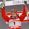 Winner Marit Bjoergen of Norway celebrates her medal won in women sprint free style race of Tour de Ski race of FIS cross country skiing World cup race in Toblach-Dobbiaco, Italy. Women sprint race, stage 6 of Tour de Ski and FIS cross country skiing World cup was held on Toblach-Dobbiaco, Italy, on Wednesday, 4th of January 2012.
