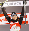 Overall Tour de Ski leader wJustyna Kowalczyk of Poland celebrates after women sprint free style race of Tour de Ski race of FIS cross country skiing World cup race in Toblach-Dobbiaco, Italy. Women sprint race, stage 6 of Tour de Ski and FIS cross country skiing World cup was held on Toblach-Dobbiaco, Italy, on Wednesday, 4th of January 2012.
