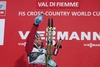 Johaug Therese (NOR) celebrate on Podium after the Ladies 5 km Cross Country of the Tour de Ski 2014 of FIS Cross Country World Cup at the Cross Country Stadium, Lago di Tesero, Italy on 2014/01/04.
