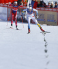Stina Nilsson of Sweden outsprints Astrid Uhrenholdt Jacobsen of Norway in finals of the women team sprint race of Viessmann FIS Cross country skiing World cup in Planica, Slovenia. Women team sprint race of Viessmann FIS Cross country skiing World cup was held on Sunday, 17th of January 2016 in Planica, Slovenia.
