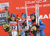 Third placed Charlotte Kalla of Sweden (L), winner Krista Parmakoski of Finland (M) and Heidi Weng of Norway (R) celebrate their success on podium after  women 10km classic race of Viessmann FIS Cross country skiing World cup in Planica, Slovenia. Women 10km classic race of Viessmann FIS Cross country skiing World cup was held on Sunday, 21st of January 2018 in Planica, Slovenia.
