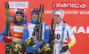 Second placed Johannes Hoesflot Klaebo of Norway (L), winner Alexey Poltoranin of Kazakhstan (M) and third placed Calle Halfvarsson of Sweden (R) celebrate their success on podium after 15km classic race of Viessmann FIS Cross country skiing World cup in Planica, Slovenia. Men 15km classic race of Viessmann FIS Cross country skiing World cup was held on Sunday, 21st of January 2018 in Planica, Slovenia.
