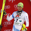 Third placed Daniel Yule of Switzerland  celebrates on podium after the men The Nightrace, night slalom race of the Audi FIS Alpine skiing World cup in Schladming, Austria. Men slalom race of the Audi FIS Alpine skiing World cup was held in Schladming, Austria, on Tuesday, 23rd of January 2018.
