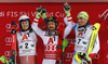 Winner Marcel Hirscher of Austria(M), second placed Henrik Kristoffersen of Norway (L) and third placed Daniel Yule of Switzerland (R)  celebrate on podium after the men The Nightrace, night slalom race of the Audi FIS Alpine skiing World cup in Schladming, Austria. Men slalom race of the Audi FIS Alpine skiing World cup was held in Schladming, Austria, on Tuesday, 23rd of January 2018.
