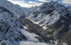 Aerial views of Planica Nordic Center and cross country skiing tracks where FIS Nordic skiing World Championships 2023 will be held in less then month time. Venue is getting ready and workers are preparing last details for World Championships to go through without problems on cold winter morning of 27th of January 2023.