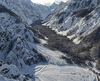 Aerial views of Planica Nordic Center and cross country skiing tracks where FIS Nordic skiing World Championships 2023 will be held in less then month time. Venue is getting ready and workers are preparing last details for World Championships to go through without problems on cold winter morning of 27th of January 2023.