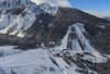 Aerial views of Planica Nordic Center and cross country skiing tracks where FIS Nordic skiing World Championships 2023 will be held in less then month time. Venue is getting ready and workers are preparing last details for World Championships to go through without problems on cold winter morning of 27th of January 2023.