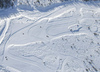 Aerial views of Planica Nordic Center and cross country skiing tracks where FIS Nordic skiing World Championships 2023 will be held in less then month time. Venue is getting ready and workers are preparing last details for World Championships to go through without problems on cold winter morning of 27th of January 2023.