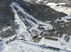 Aerial views of Planica Nordic Center and cross country skiing tracks where FIS Nordic skiing World Championships 2023 will be held in less then month time. Venue is getting ready and workers are preparing last details for World Championships to go through without problems on cold winter morning of 27th of January 2023.