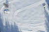 Aerial views of Planica Nordic Center and cross country skiing tracks where FIS Nordic skiing World Championships 2023 will be held in less then month time. Venue is getting ready and workers are preparing last details for World Championships to go through without problems on cold winter morning of 27th of January 2023.