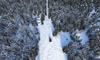 Aerial views of Planica Nordic Center and cross country skiing tracks where FIS Nordic skiing World Championships 2023 will be held in less then month time. Venue is getting ready and workers are preparing last details for World Championships to go through without problems on cold winter morning of 27th of January 2023.