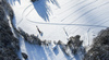 Aerial views of Planica Nordic Center and cross country skiing tracks where FIS Nordic skiing World Championships 2023 will be held in less then month time. Venue is getting ready and workers are preparing last details for World Championships to go through without problems on cold winter morning of 27th of January 2023.