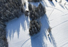 Aerial views of Planica Nordic Center and cross country skiing tracks where FIS Nordic skiing World Championships 2023 will be held in less then month time. Venue is getting ready and workers are preparing last details for World Championships to go through without problems on cold winter morning of 27th of January 2023.