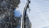 Aerial views of Planica Nordic Center and cross country skiing tracks where FIS Nordic skiing World Championships 2023 will be held in less then month time. Venue is getting ready and workers are preparing last details for World Championships to go through without problems on cold winter morning of 27th of January 2023.