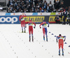 Winner Johannes Hoesflot Klaebo of Norway (L) celebrates his victory while second placed Paal Golberg of Norway (M) and third placed Jules Chappaz of France (R) fighting for second place in men finals of the Cross country skiing sprint race of FIS Nordic skiing World Championships 2023 in Planica, Slovenia. Cross country skiing sprint race of FIS Nordic skiing World Championships 2023 were held in Planica Nordic Center in Planica, Slovenia, on Thursday, 23rd of February 2023.