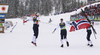 Winning team of Norway celebrating  and waiting their last leg Anne Kjersti Kalvaa of Norway coming to finish line in the women cross country skiing relay race of FIS Nordic skiing World Championships 2023 in Planica, Slovenia. Women cross country skiing relay race of FIS Nordic skiing World Championships 2023 was held in Planica Nordic Center in Planica, Slovenia, on Thursday, 2nd of March 2023.