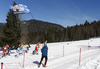 Kerttu Niskanen of Finland skiing next to Finnish fans during women cross country skiing 30km classic race of FIS Nordic skiing World Championships 2023 in Planica, Slovenia. Women cross country skiing 30km classic race of FIS Nordic skiing World Championships 2023 was held in Planica Nordic Center in Planica, Slovenia, on Saturday, 4th of March 2023.