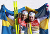 Winner Ebba Andersson of Sweden (R) and third placed Frida Karlsson of Sweden (L) celebrate in finish of the women cross country skiing 30km classic race of FIS Nordic skiing World Championships 2023 in Planica, Slovenia. Women cross country skiing 30km classic race of FIS Nordic skiing World Championships 2023 was held in Planica Nordic Center in Planica, Slovenia, on Saturday, 4th of March 2023.