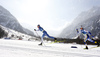 Iivo Niskanen of Finland (L) and William Poromaa of Sweden (R) skiing during men cross country skiing 50km classic race of FIS Nordic skiing World Championships 2023 in Planica, Slovenia. Men cross country skiing 50km classic race of FIS Nordic skiing World Championships 2023 was held in Planica Nordic Center in Planica, Slovenia, on Sunday, 5th of March 2023.