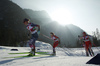 Novie Mccabe of USA (L), Margrethe Bergane of Norway (M) and Anja Weber of Switzerland (R) skiing during U23 women cross country skiing 20km mass start skating race of FIS Junior Nordic skiing World Championships 2024 in Planica, Slovenia. U23 women cross country skiing 20km mass start skating race of FIS Junior Nordic skiing World Championships 2024 was held in Planica Nordic Center in Planica, Slovenia, on Thursday, 8th of February 2024.