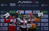 Winner Minja Korhonen of Finland (M), second placed Alexa Brabec of USA (L) and third placed Ronja Loh of Germany (R) celebrate their medal won in women junior nordic combined race of FIS Junior Nordic skiing World Championships 2024 in Planica, Slovenia. Women junior nordic combined race of FIS Junior Nordic skiing World Championships 2024 was held in Planica Nordic Center in Planica, Slovenia, on Friday, 9th of February 2024.